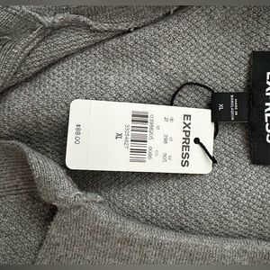 Brand new, never been worn men’s express sweater. Still has the tags!